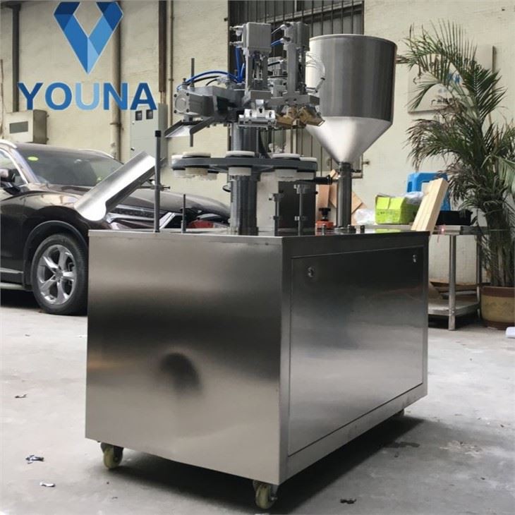 Machine de remplissage et de scellage de tubes de crème