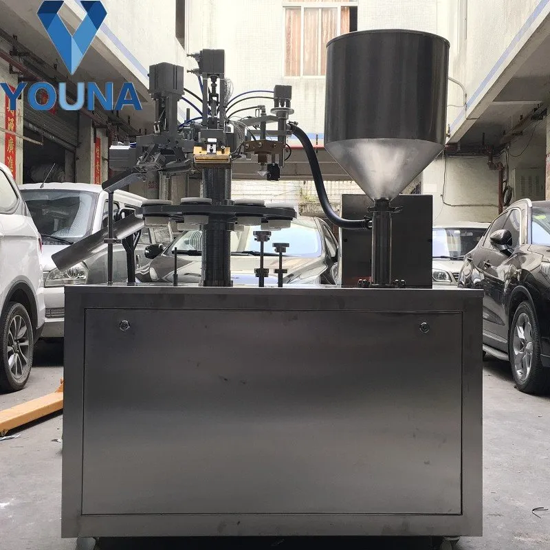 Machine semi-automatique de remplissage et de scellage de tubes