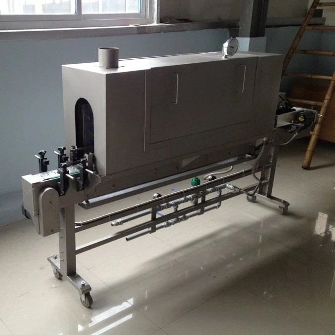 Machine d'emballage sous film rétractable à la vapeur